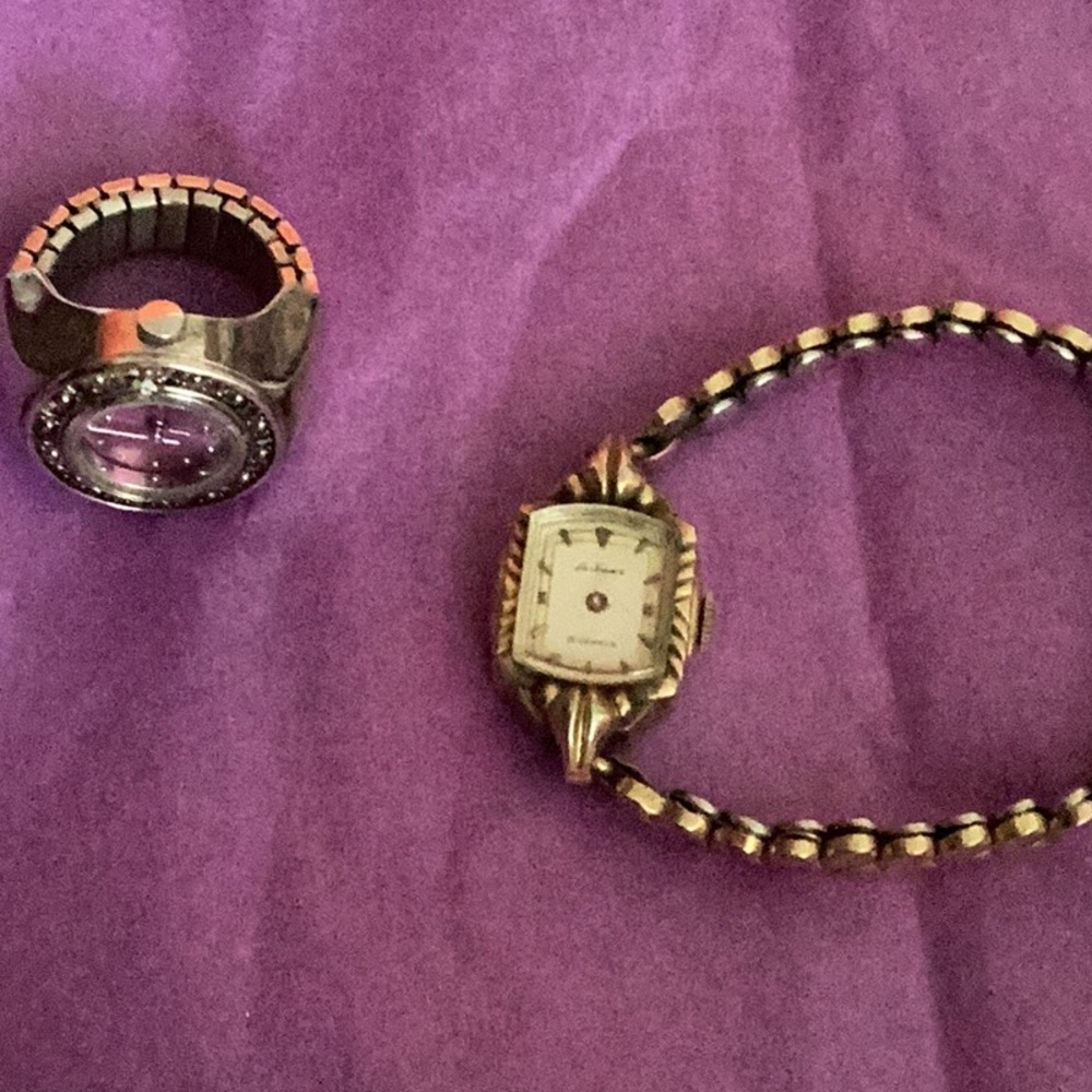 Two watches , vintage la France and Avon finger watch